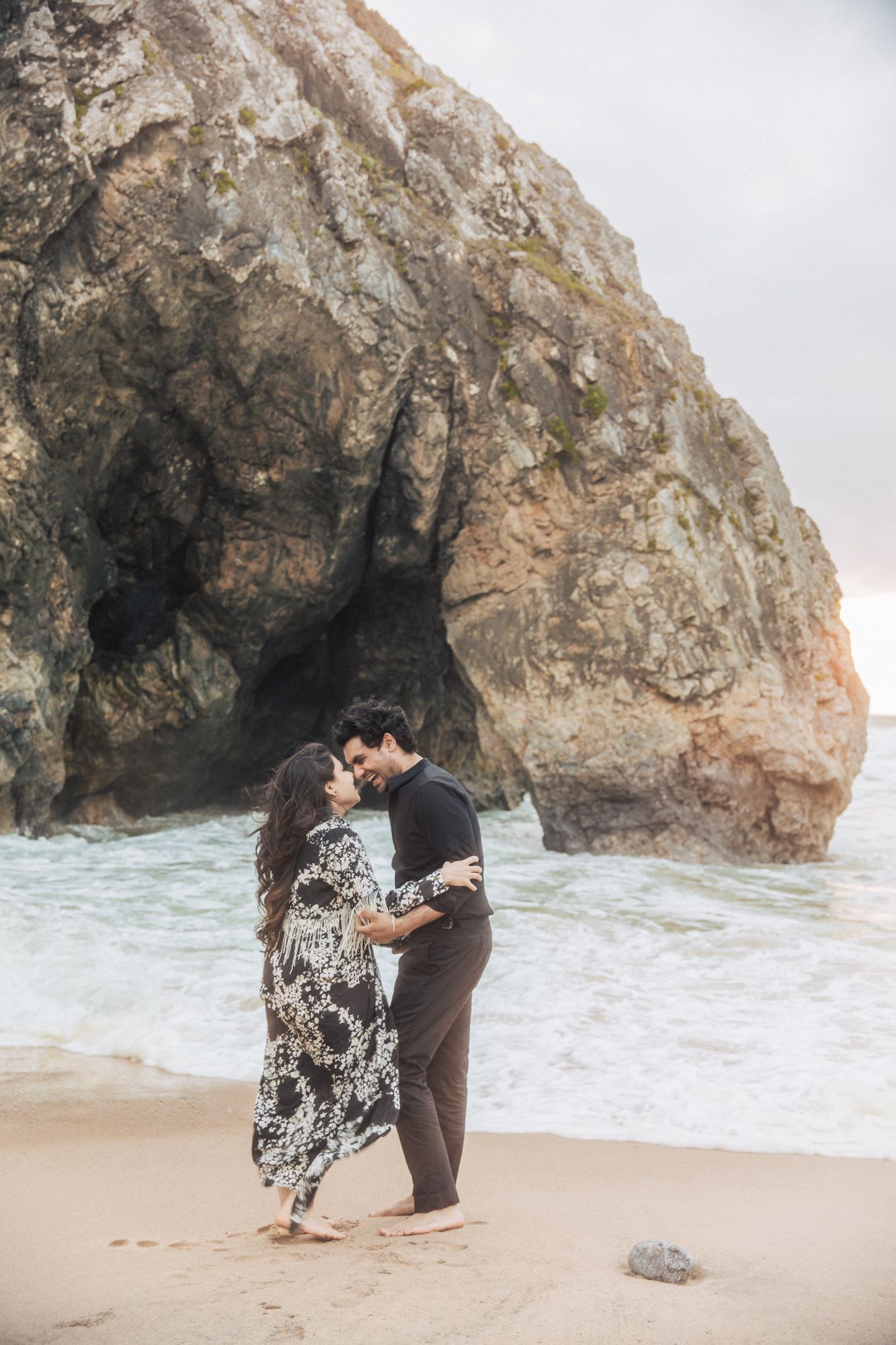 Romantic engagement photoshoot by the adraga beach in Sintra during a Destination Wedding in Portugal