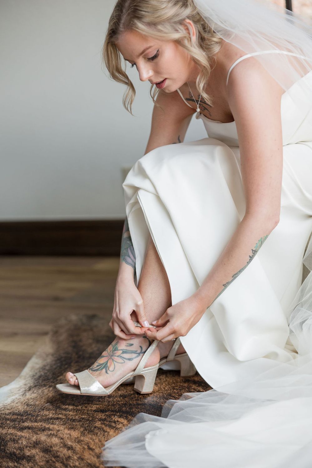 Bride getting ready at mountain Airbnb during Breckenridge wedding