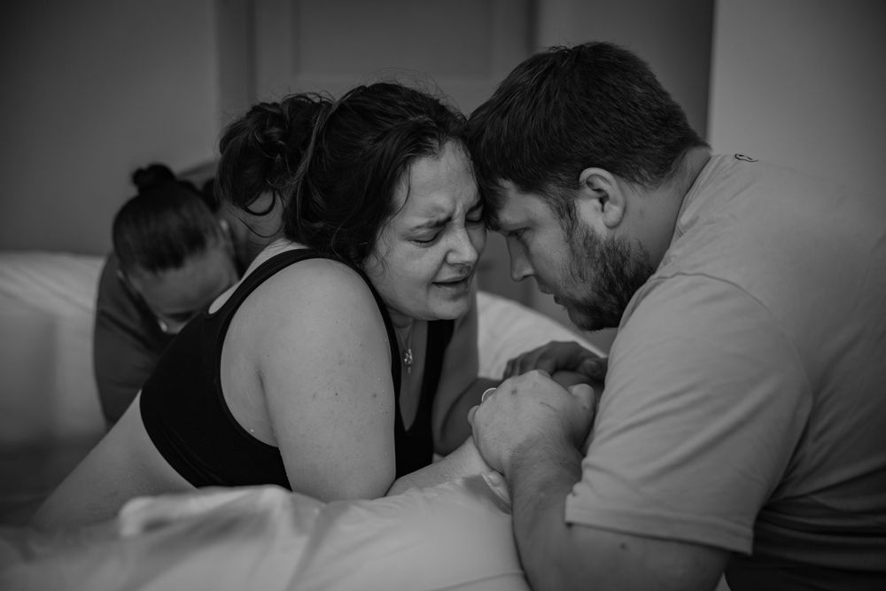 Intense labor moment cape town birth photographer By Grace Photography