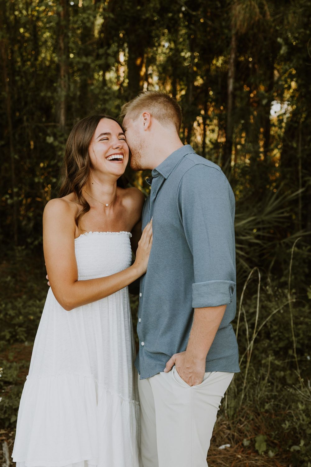 Golden hour Engagement photos captured by Lindsay McDow Photography in the greenery of a nature trail in West Palm Beach, Florida