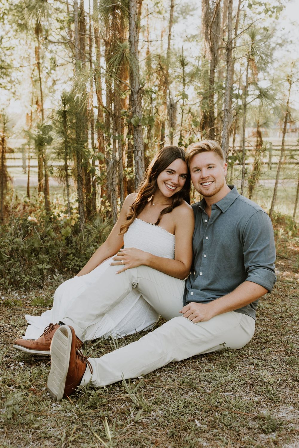 Golden hour Engagement photos captured by Lindsay McDow Photography in the greenery of a nature trail in West Palm Beach, Florida