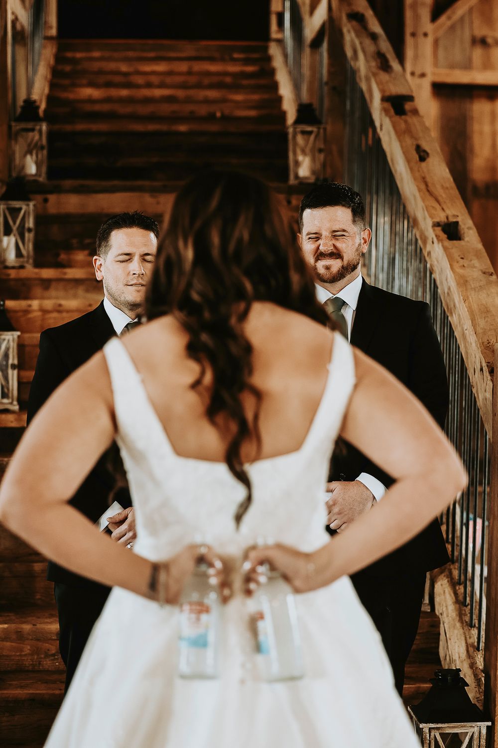 the bride ices her flower dudes just before they walk down the aisle