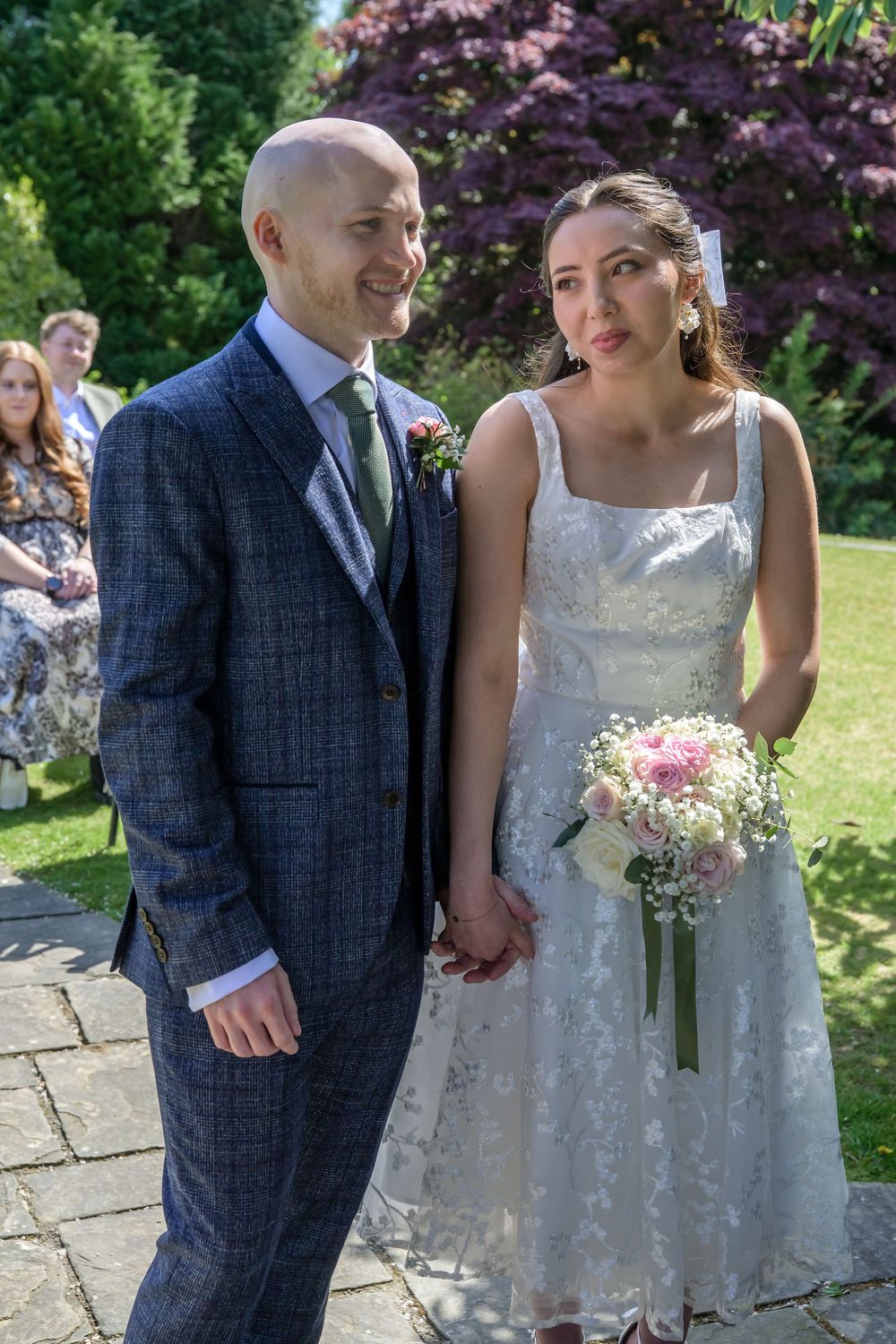Bride looking at groom during wedding ceremony at Cragwood Country House