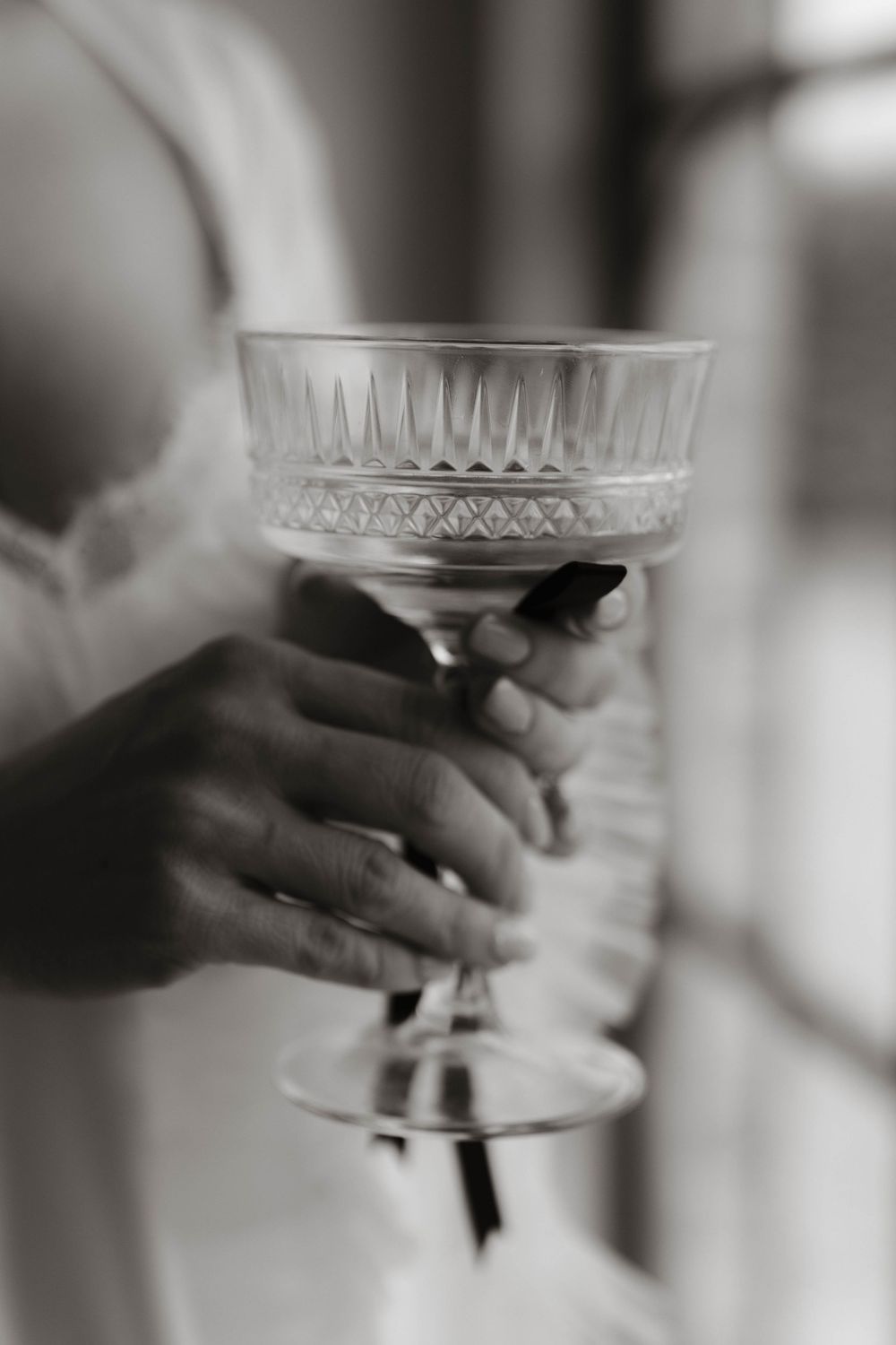 bride holds champagne glass at Primrose Hill farm Wedding- Photo by Primrose Hill Farm Wedding Photographer, Olivia J Morgan Photography