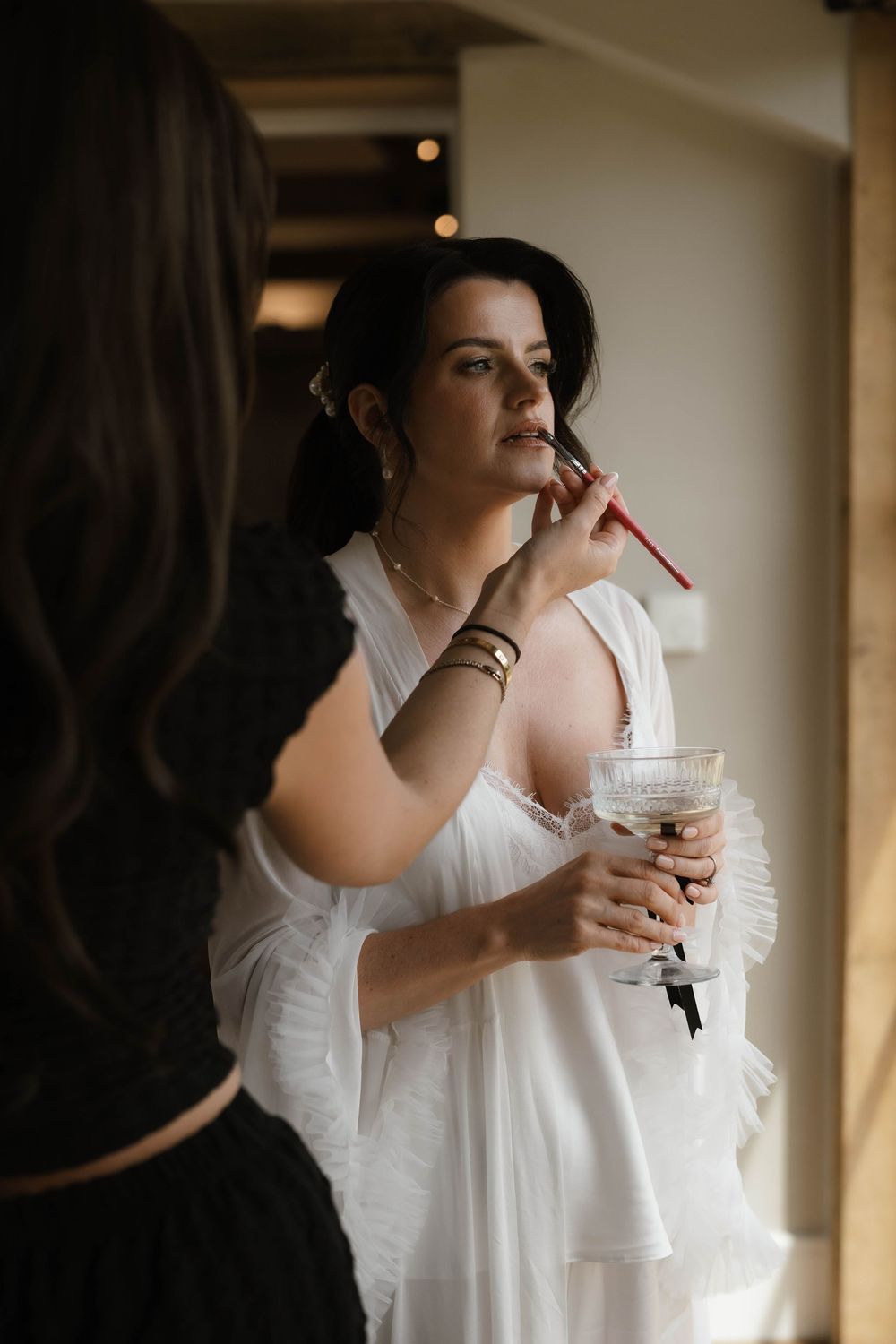 bride has makeup done at Primrose Hill farm Wedding- Photo by Primrose Hill Farm Wedding Photographer, Olivia J Morgan Photography