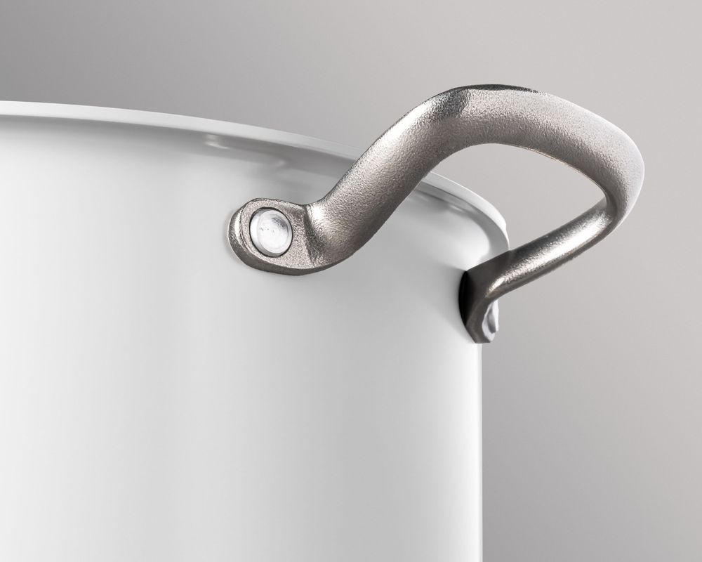 Close-up detail of metallic paint can handle and rim.
