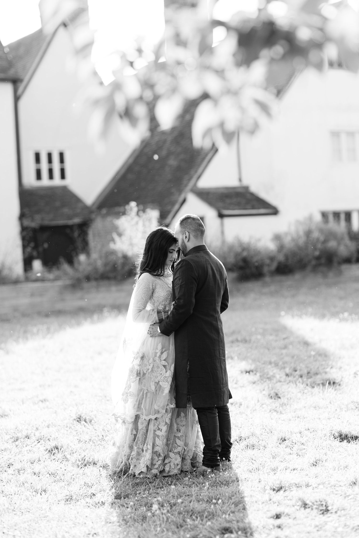 Romantic moment of Indian bride and groom at the Great Barn in Harrow