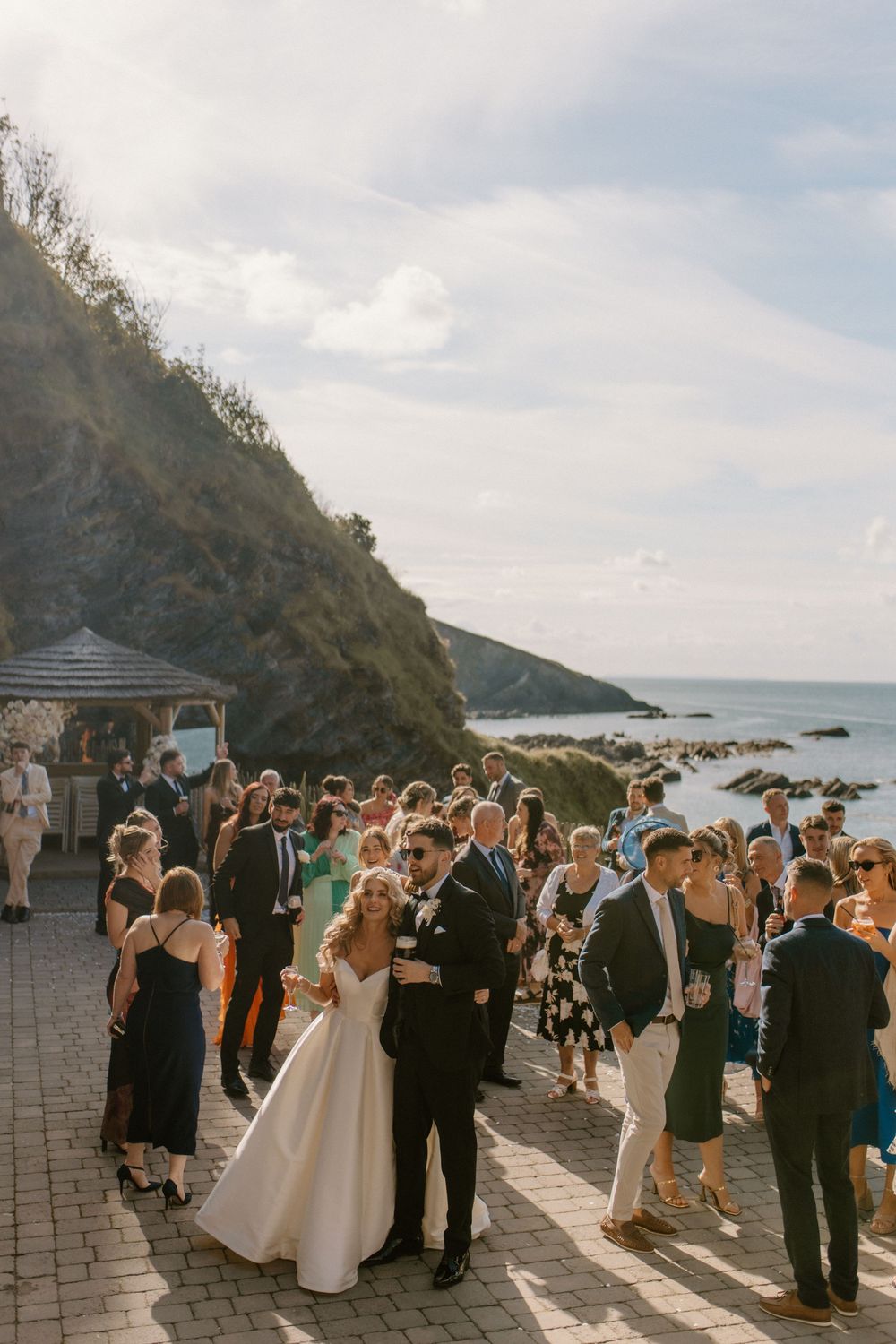 Tunnels Beaches reception with guests celebrating on the terrace