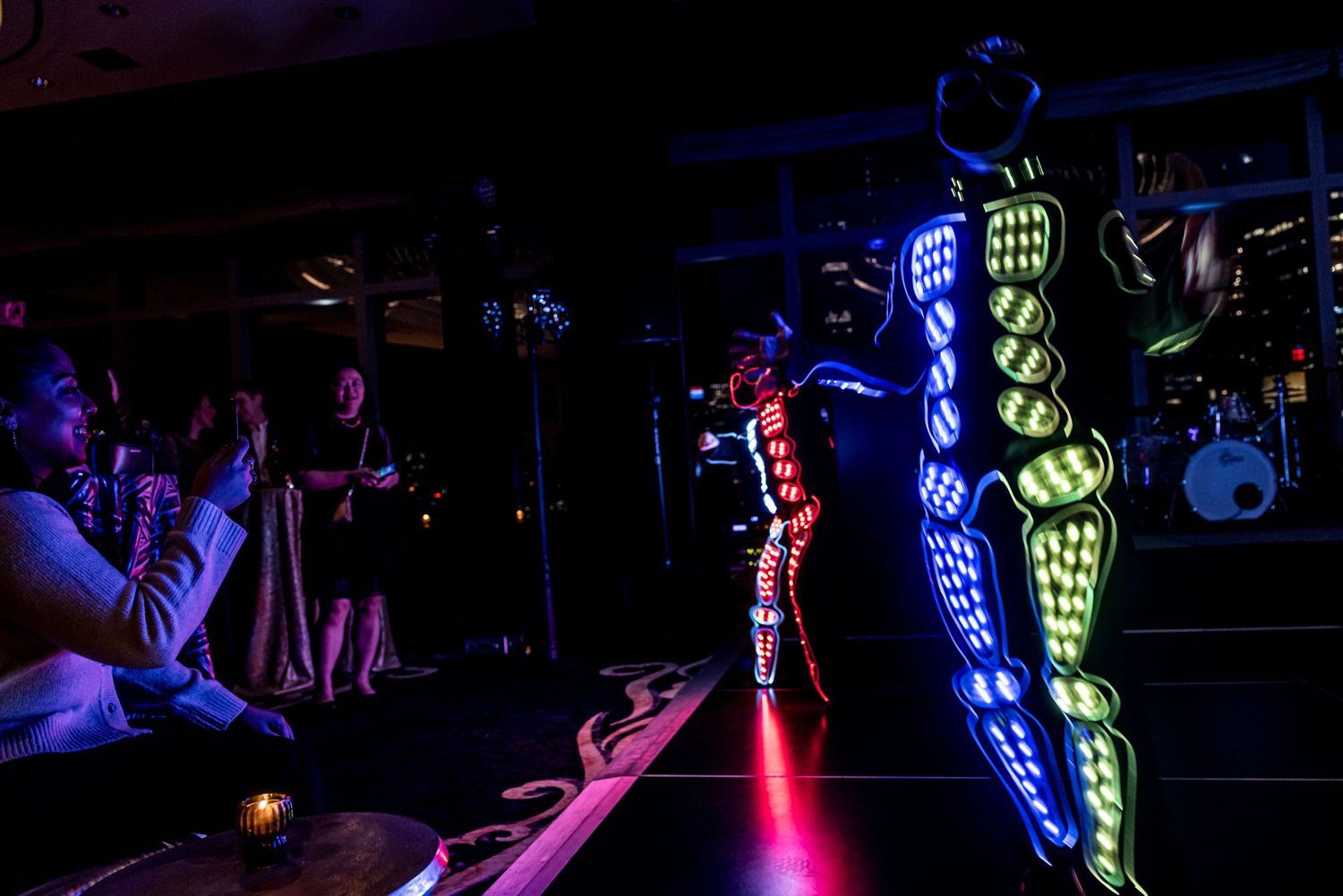 Guests enjoying the festive atmosphere at the GA Holiday Party, captured in an elegant setting