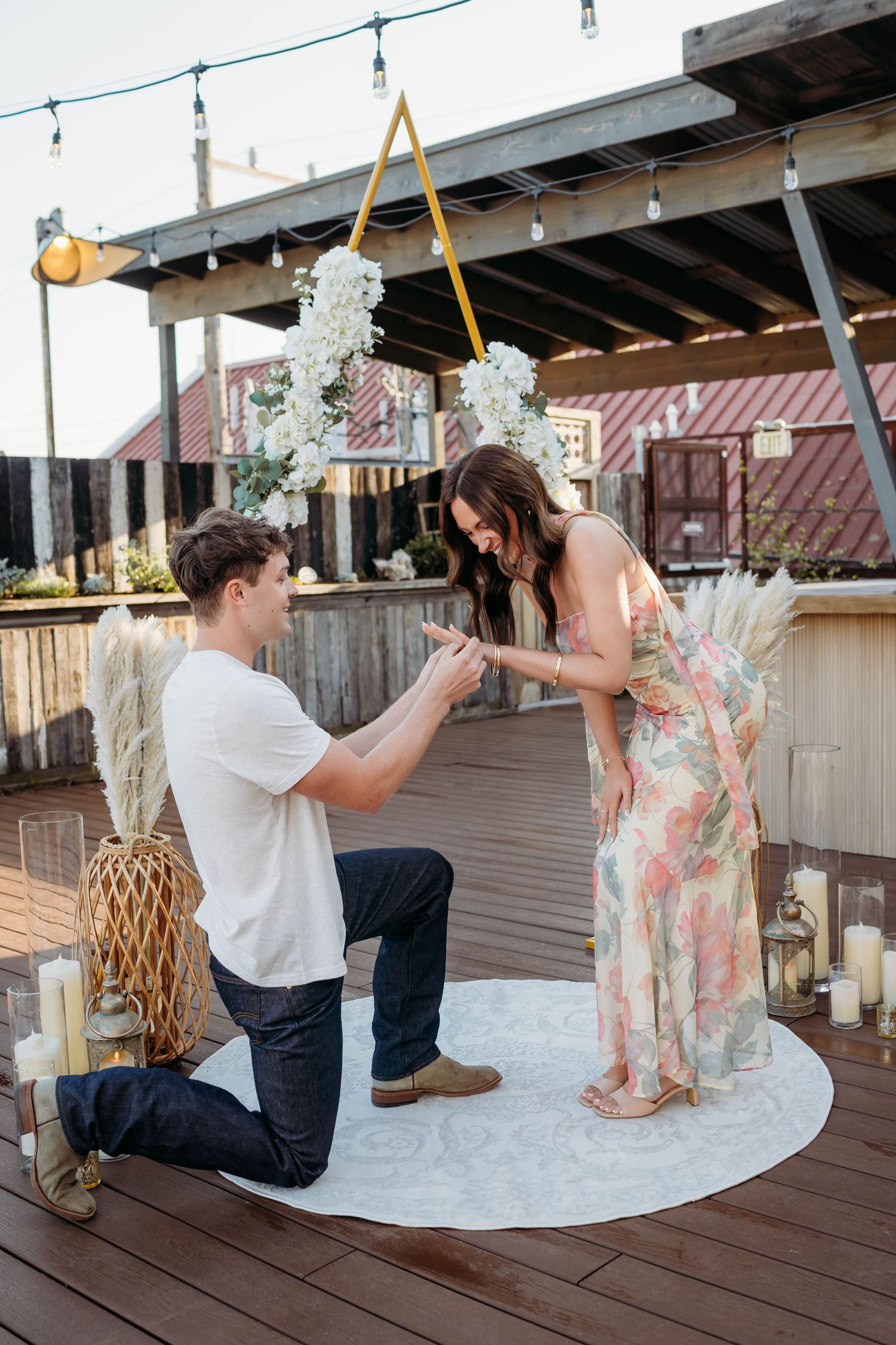 Indoor rustic venue decorated with glowing string lights and vintage decor creating a warm, romantic atmosphere.