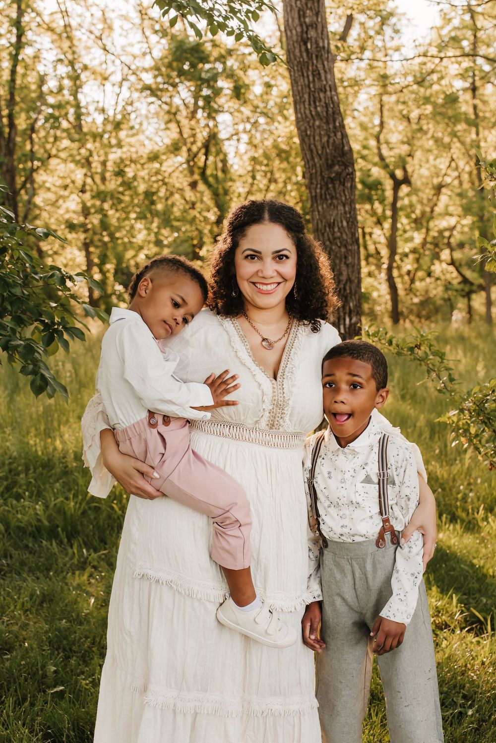 mom and sons cuddle together