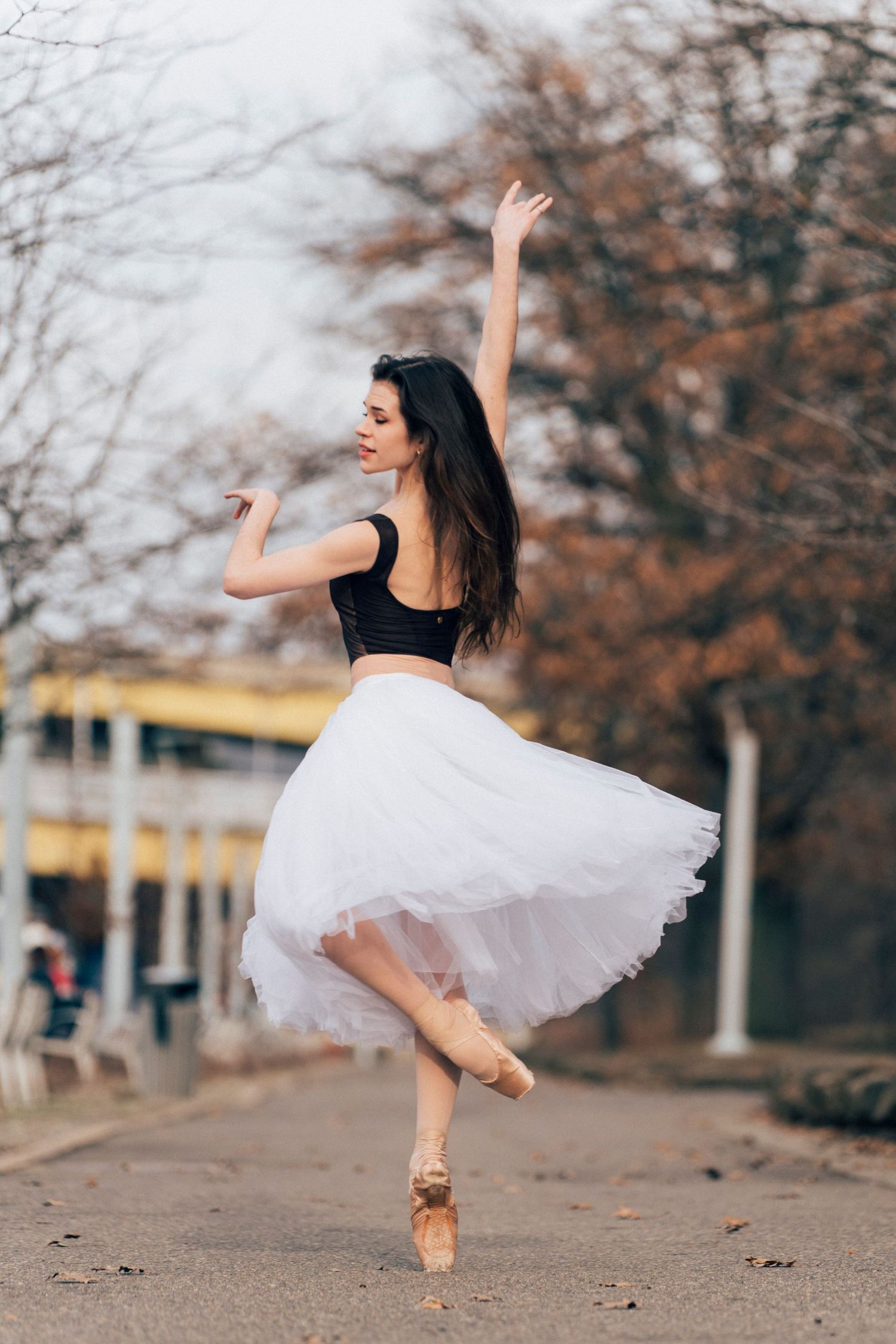 Elegant ballerina in flowing costume performing outdoors in downtown Pittsburgh ballet photographer