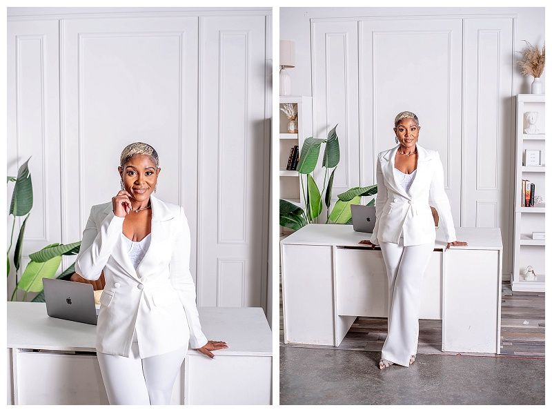 Business professional woman in a stylish white suit posing in a West Palm Beach office studio for personal branding photos.