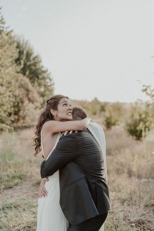 Intimate close-up of the couple laughing after the ceremony — documentary-style wedding photography in Portugal