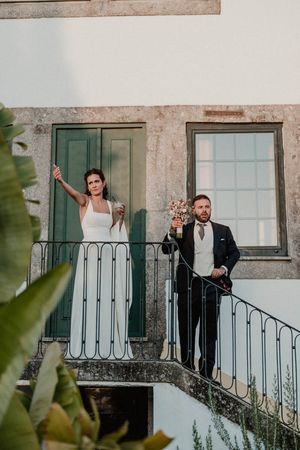 Bride throwing the bouquet at The Astoria by Histórias com Alma, Porto