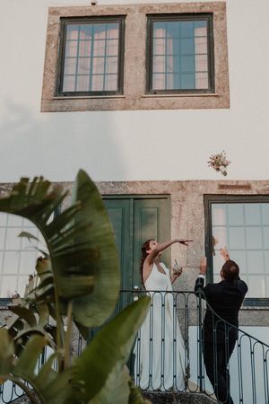 Bride throwing the bouquet at The Astoria by Histórias com Alma, Porto
