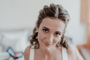 Candid bridal portrait with expressive eyes — emotional storytelling captured at The Astoria, Porto.
