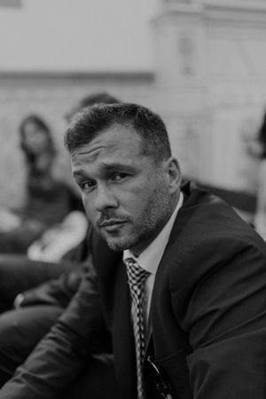 Dramatic guest portrait during a wedding in Porto — candid moment at The Astoria by destination wedding photographer.