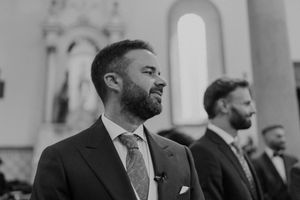 groom first look waiting at the altar during a traditional wedding in Portugal