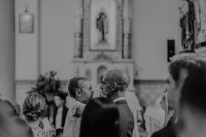 Father and child sharing a quiet moment before the wedding ceremony — candid storytelling at a destination wedding in Portugal.