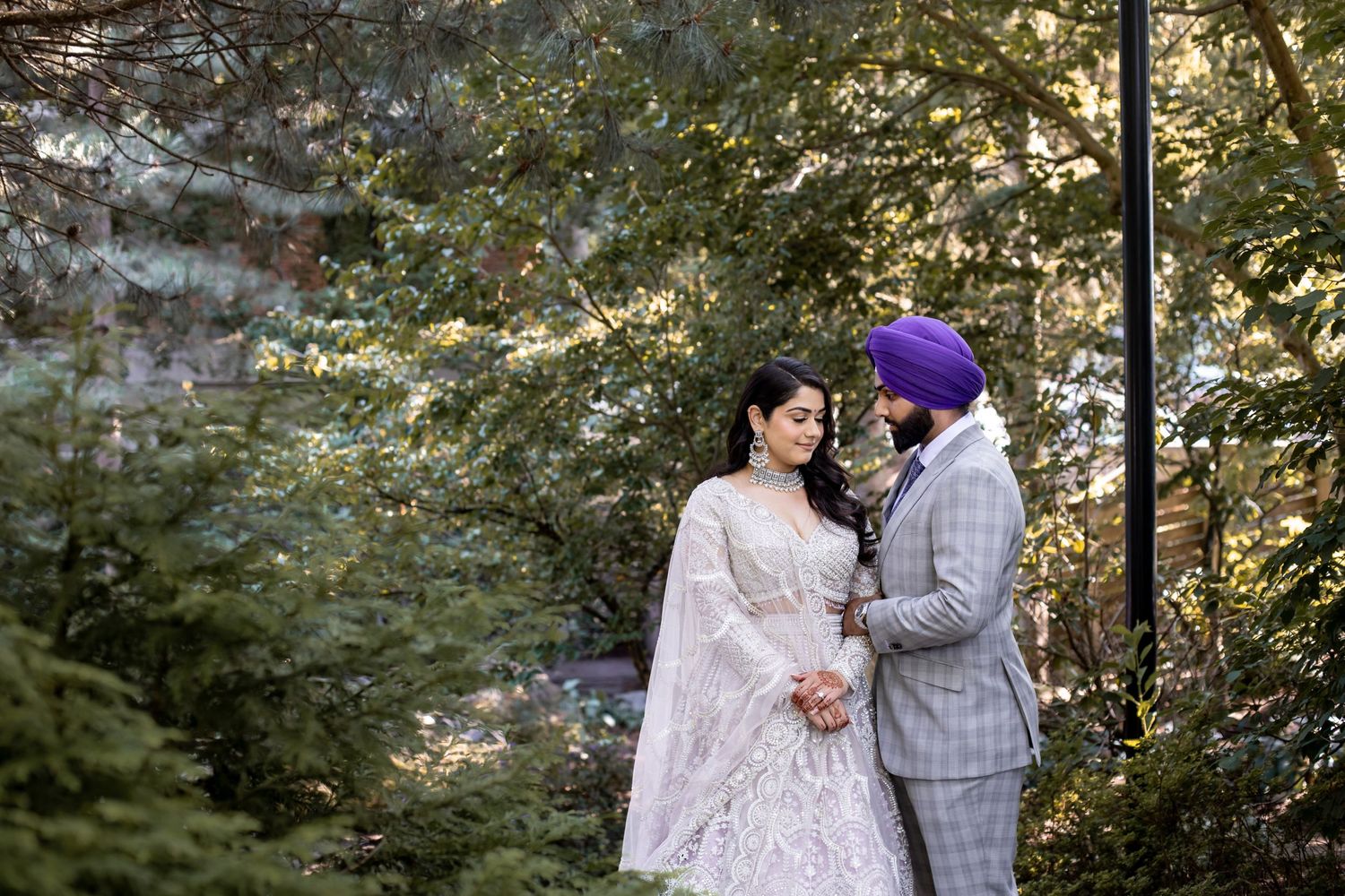 Photoshoot of a couple looking at each other.