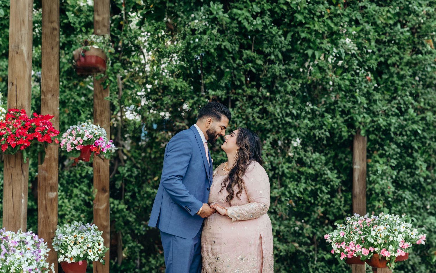 Photoshoot of a couple looking at each other.