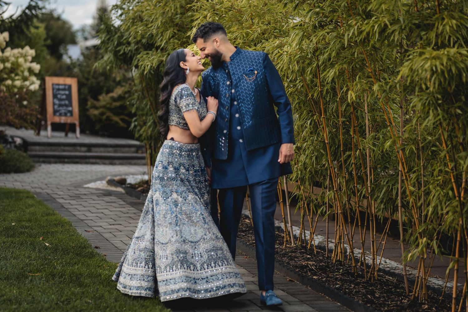 Photoshoot of couple kissing and walking.