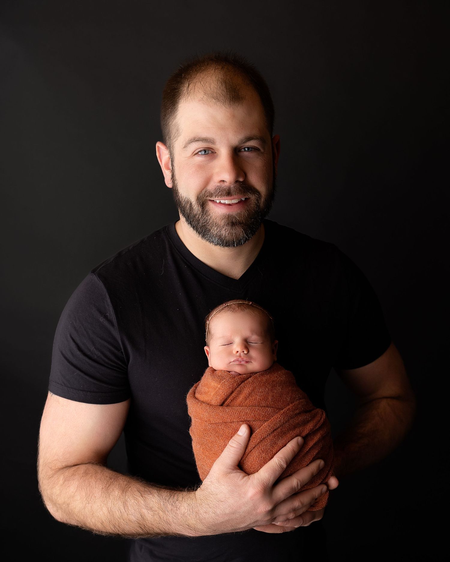professional photo of dad and baby