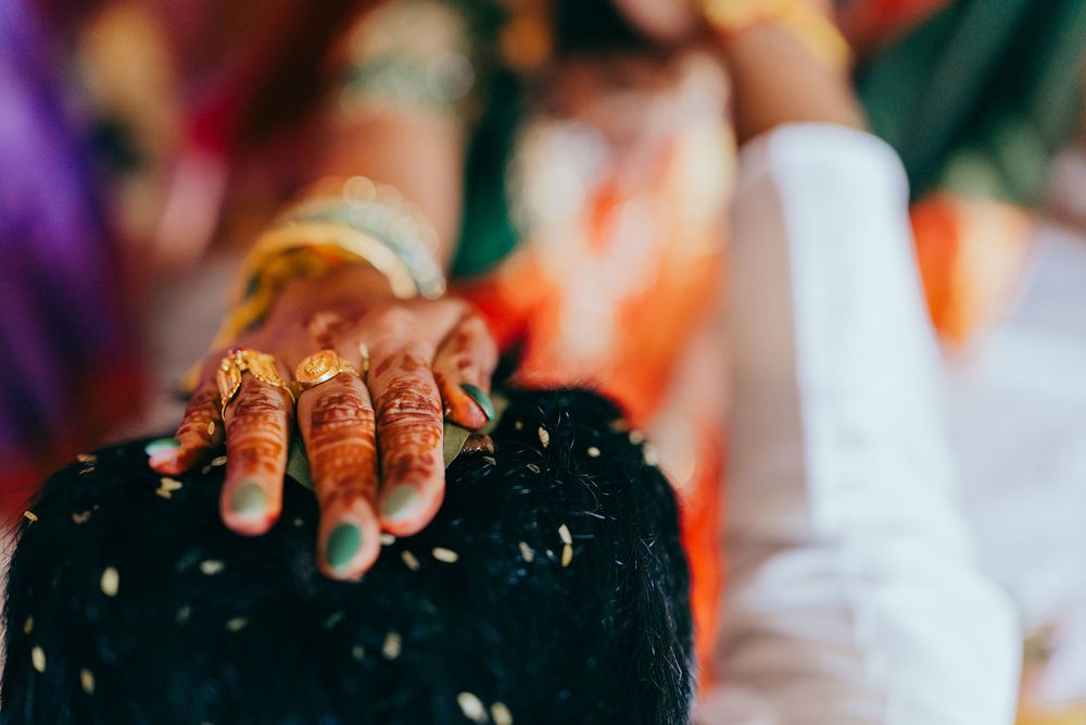 A glimpse of the bride during a traditional Telugu wedding ceremony Jeelakarra Bellam shot in Dallas, TX.