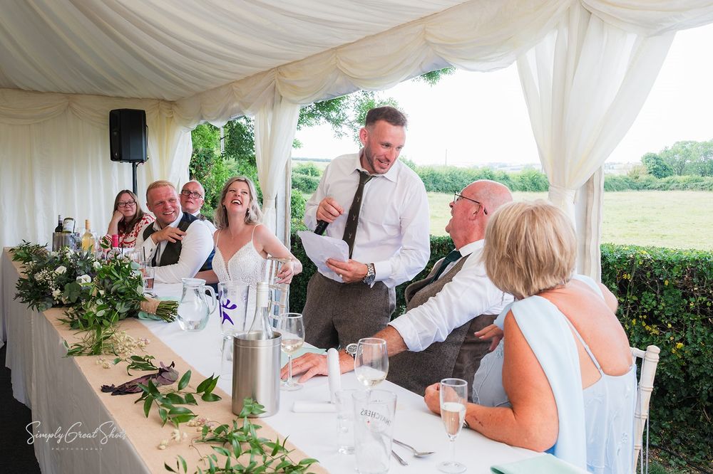 The best man's speech at the top table of Charlotte and Laurie's wedding at the Wheel and Compass pub.