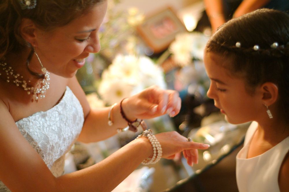 Tender candid moment captured in natural sunlight.