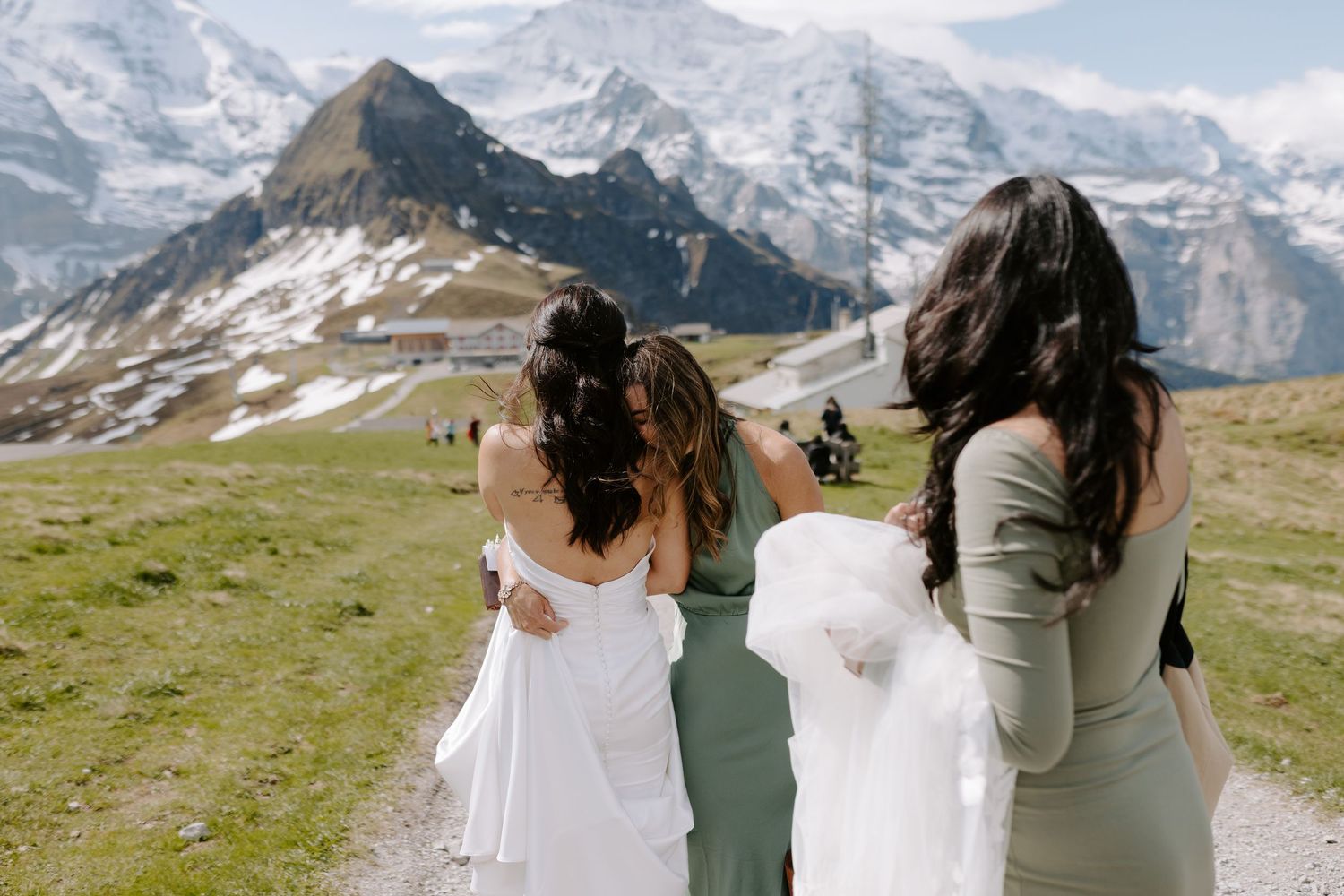 Dramatic mountain landscape with snow-covered peaks serving as backdrop for special occasion celebration.