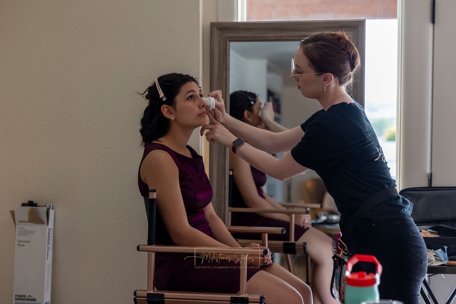 The Vanity helping bride get ready