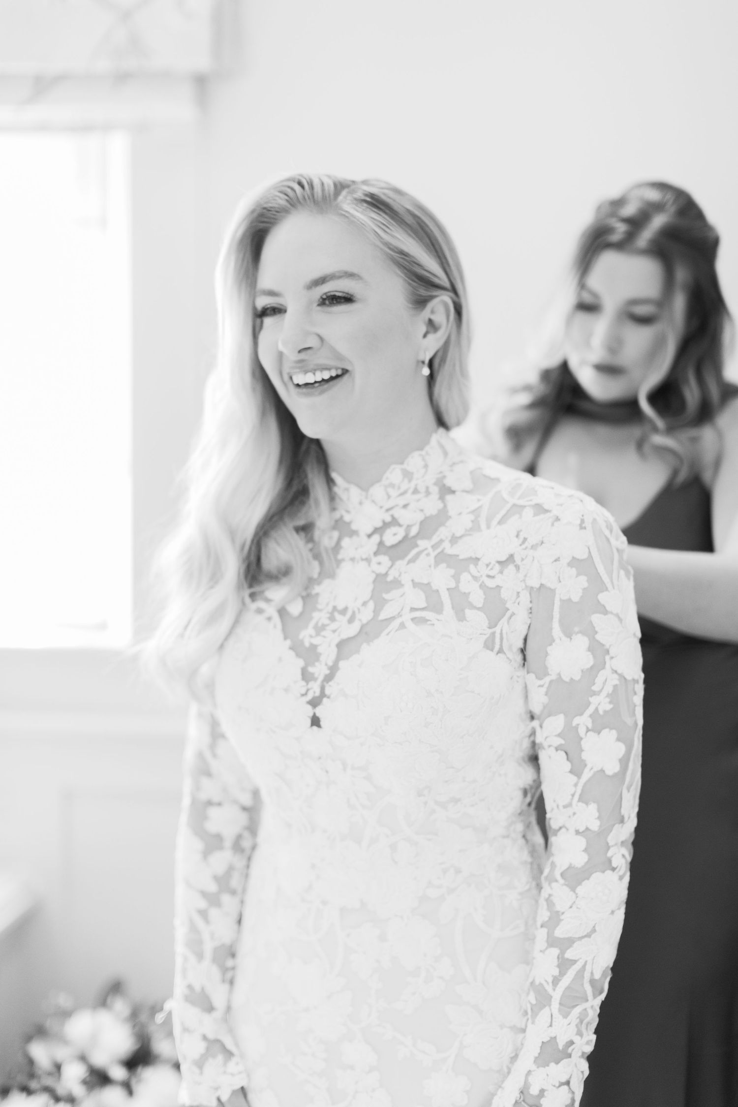 Black and white photo with bridal portrait featuring a delicate lace wedding gown at Ellenborough Park Cotswolds by Hayley Elizabeth