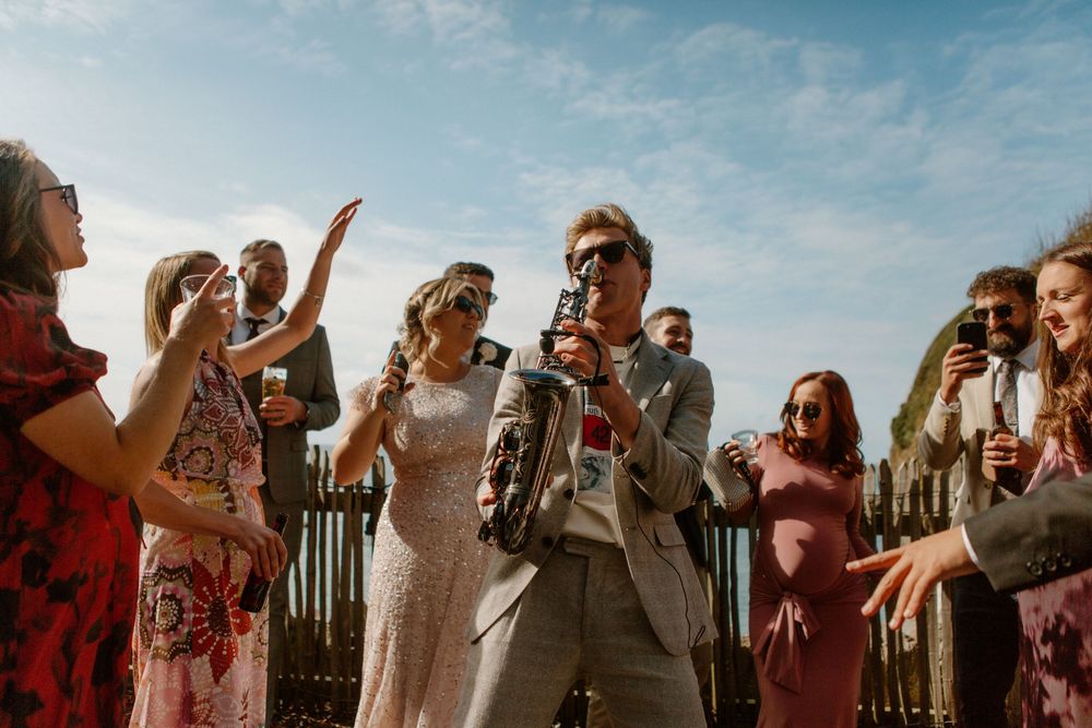 Saxophonist Dan Costin performing at Tunnels Beaches wedding