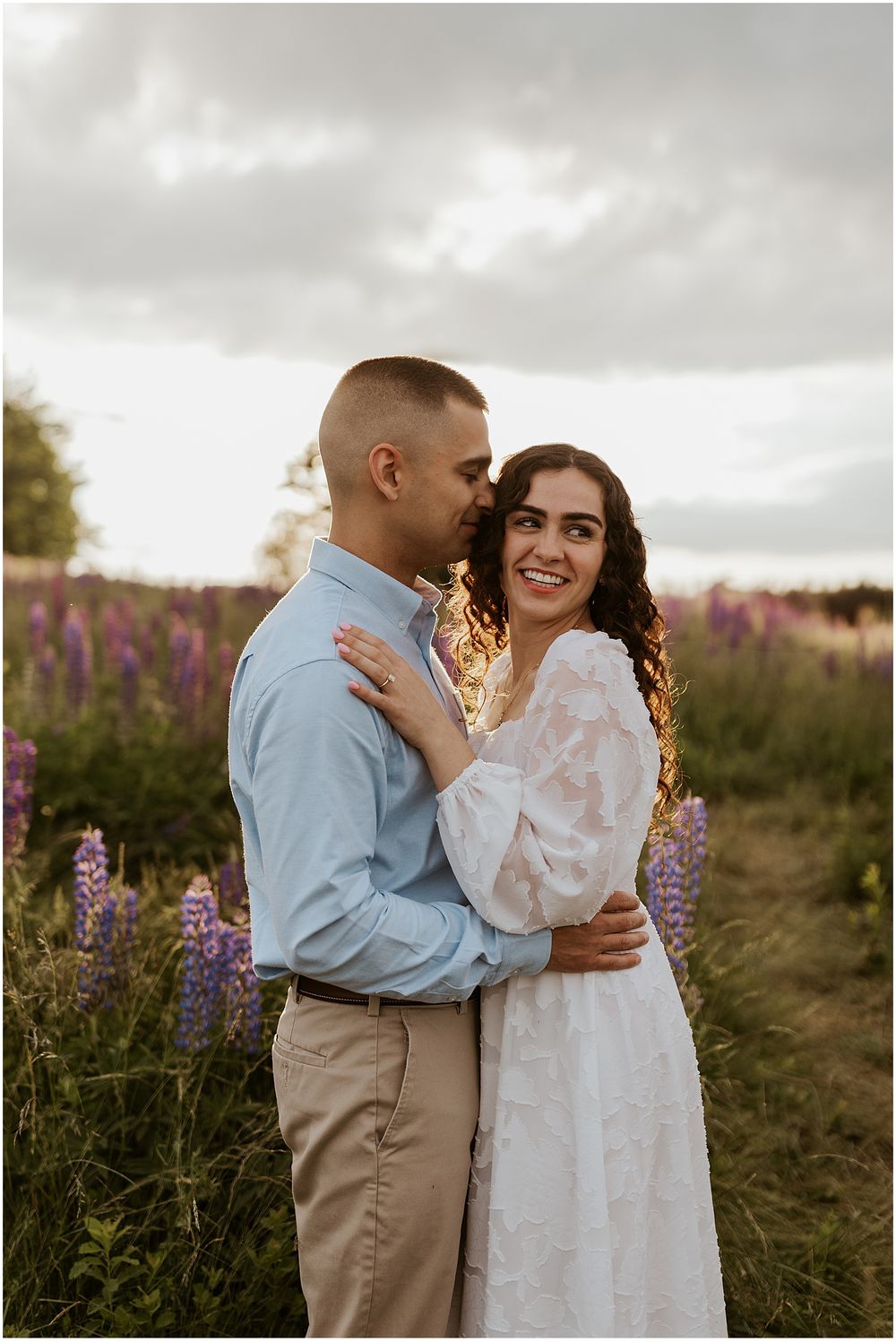 A couple taking engagement pictures in the NH White Mountains