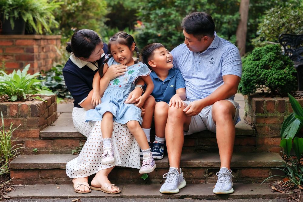 Lifestyle family photo at UGA Founders Garden captured by Athens GA family photographer