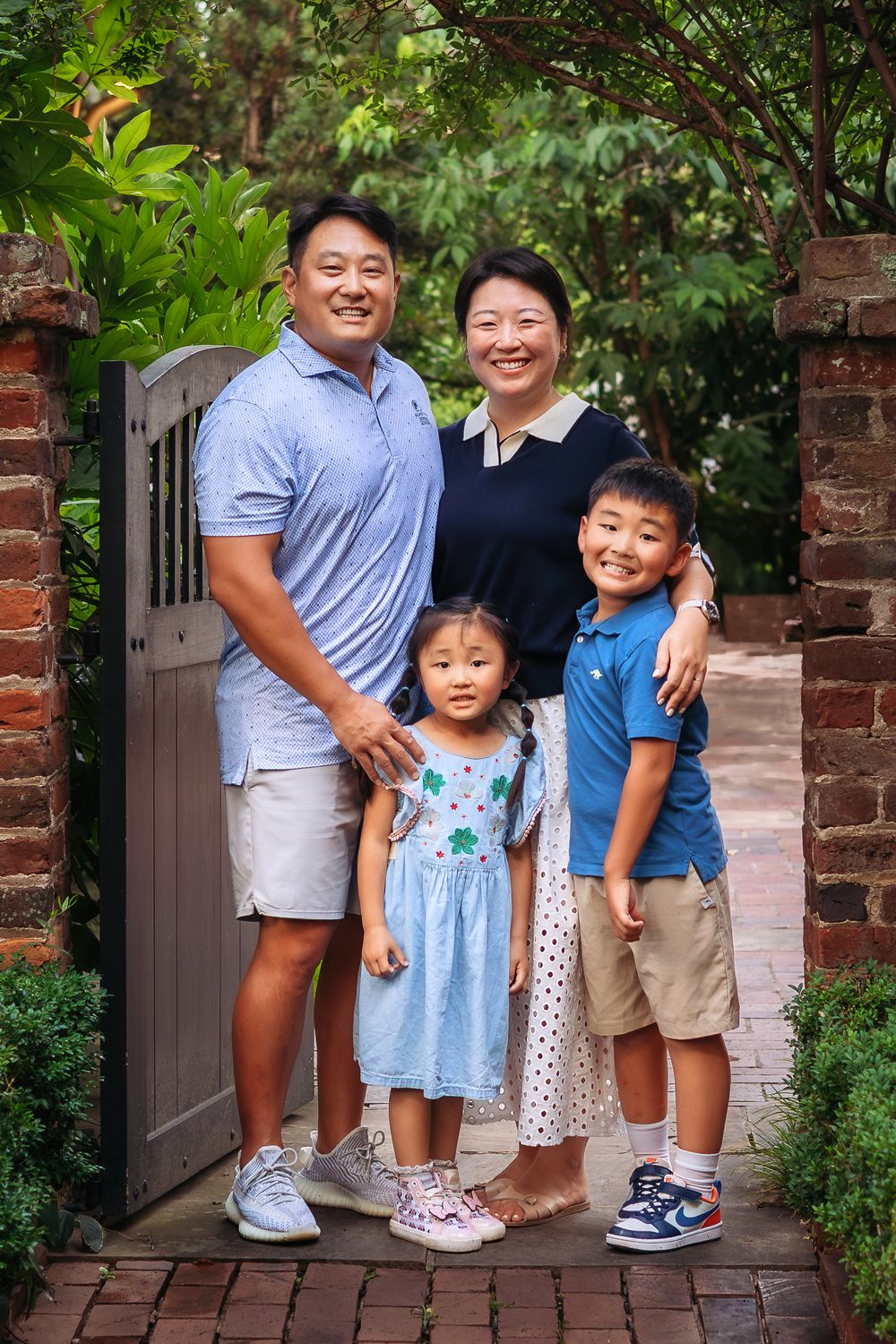 Lifestyle family photo at UGA Founders Garden captured by Athens GA family photographer by Ansley Howe Photography