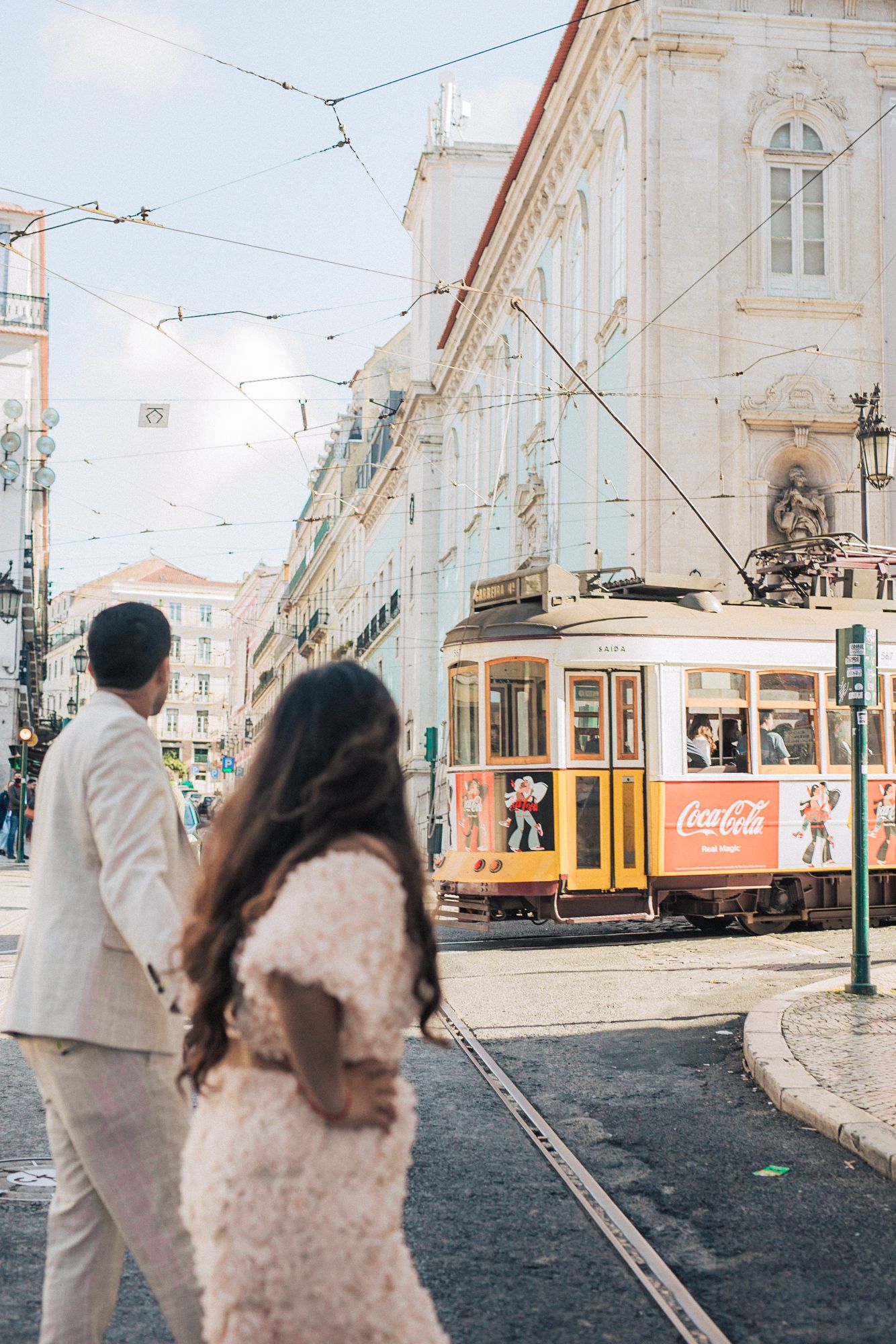 Romantic engagement photoshoot of an indian couple at the historical city of Lisbon during a Destination Wedding in Portugal