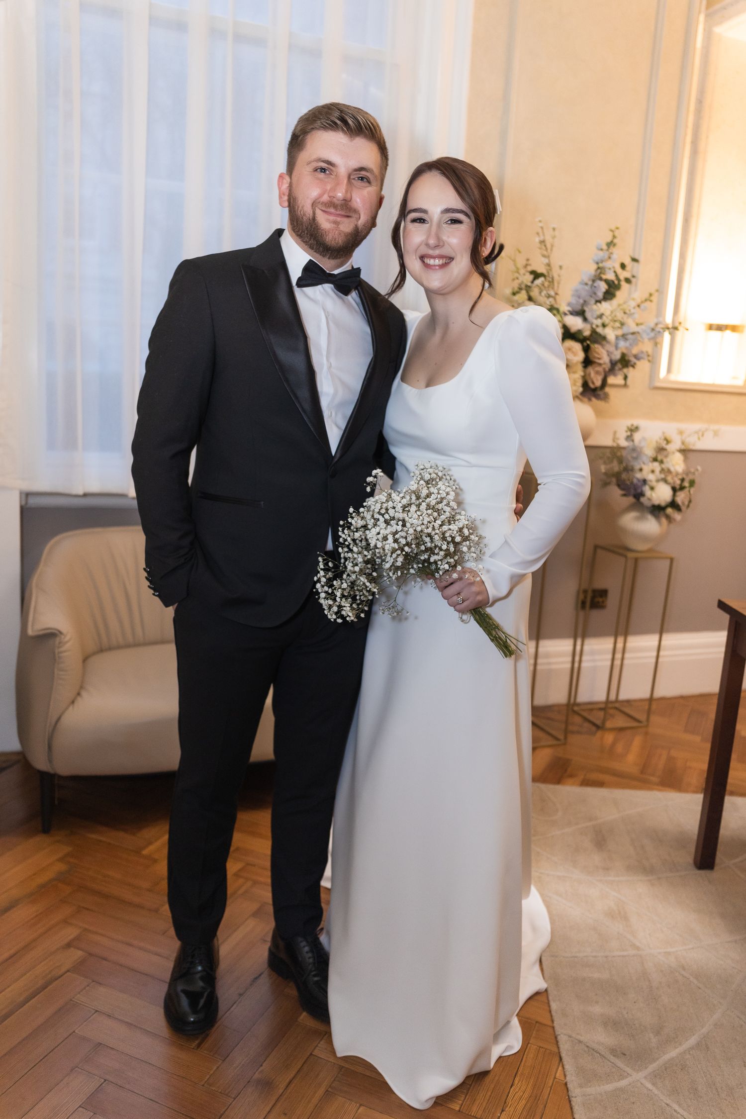 Couple portrait after the ceremony at Chelsea old town hall, relaxed couple photo by Jane Nicholson Photography.