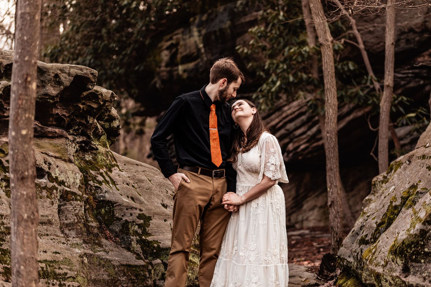 WV engaged couple gaze at each other at Coopers Rock State Park