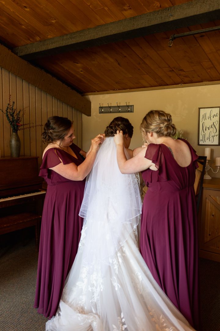 Detail photo of bride putting on vail Duluth Minnesota Wedding