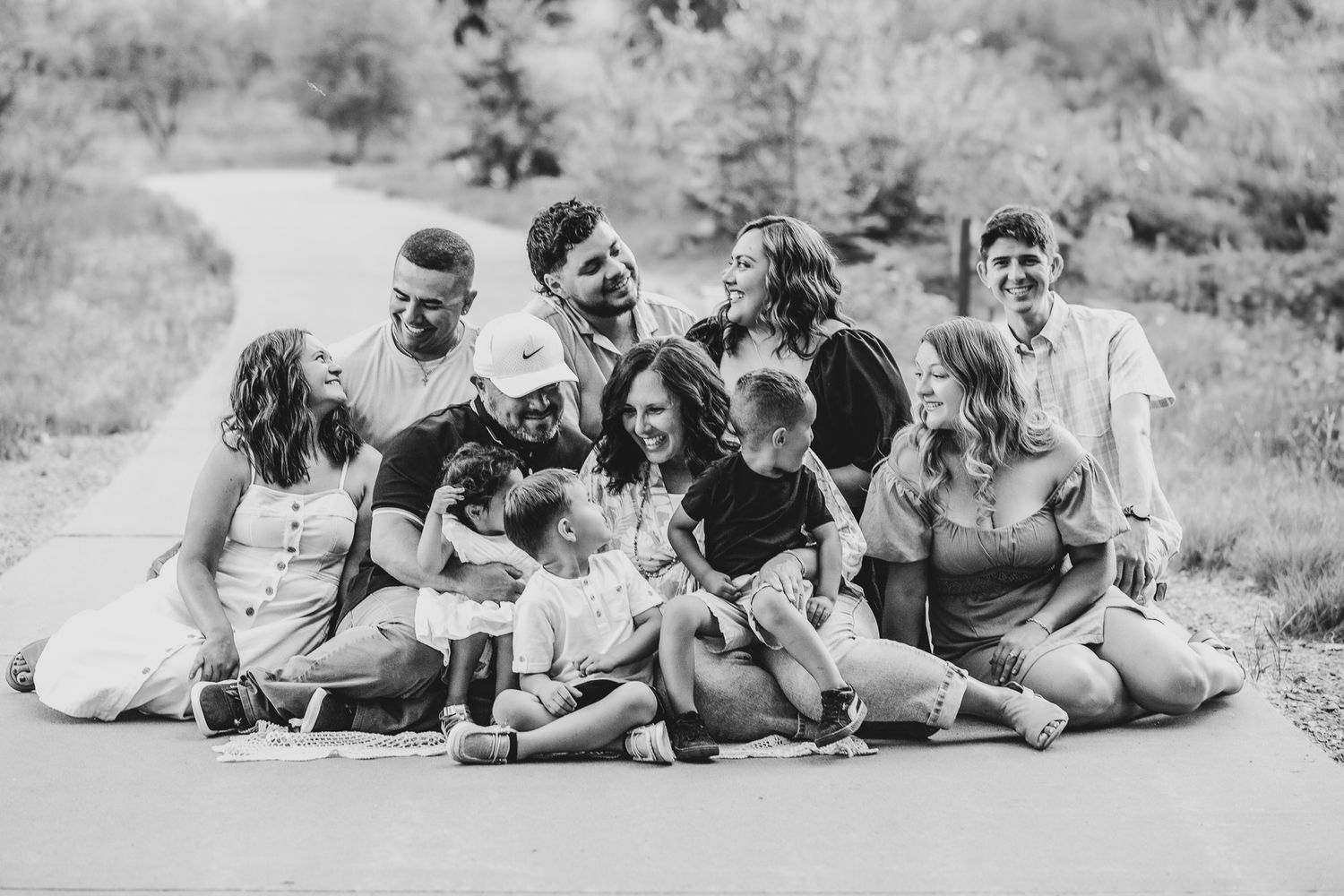 professional extended family photo session in rocky mountains in colorado. family of 12 posing in the mountains.liz rivas illuminating image