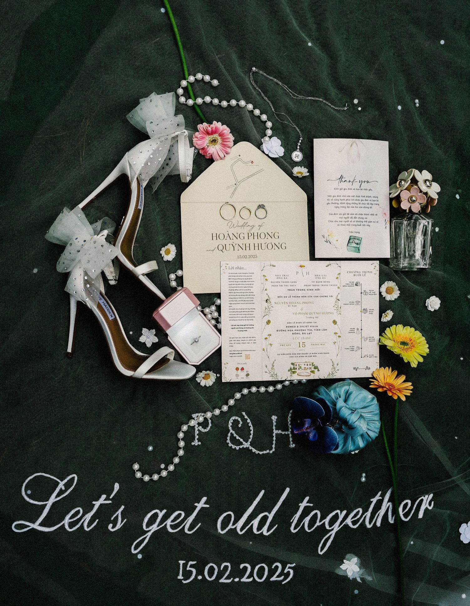 Wedding invitations, pearl necklace, white heels, and decor items arranged on dark green velvet with 'Let's get odd together' text.