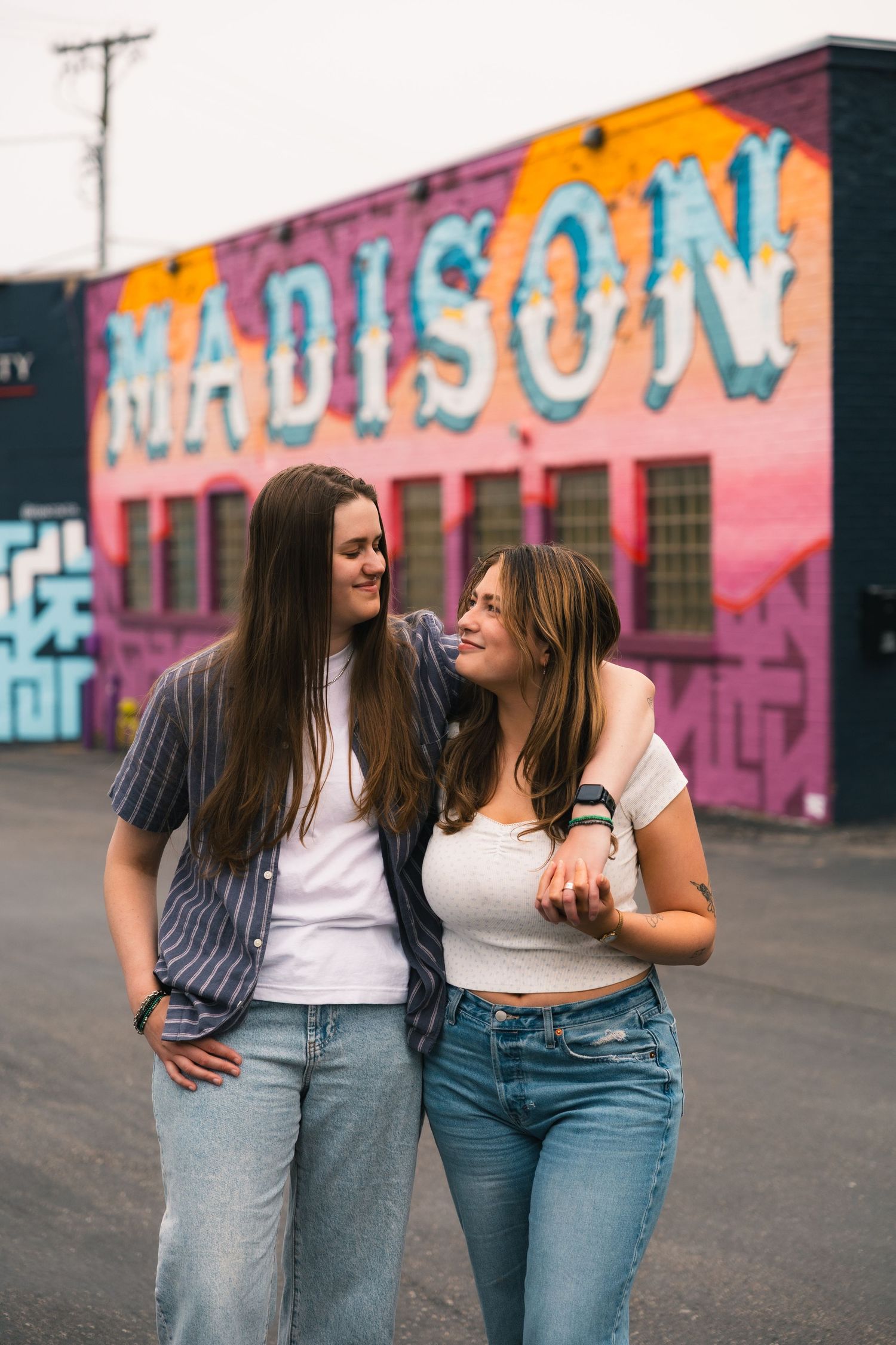 madison wi couples engagement photographer monroe street mural triangulador lauer realty group lgbtq colorful unique photos wisconsin urban