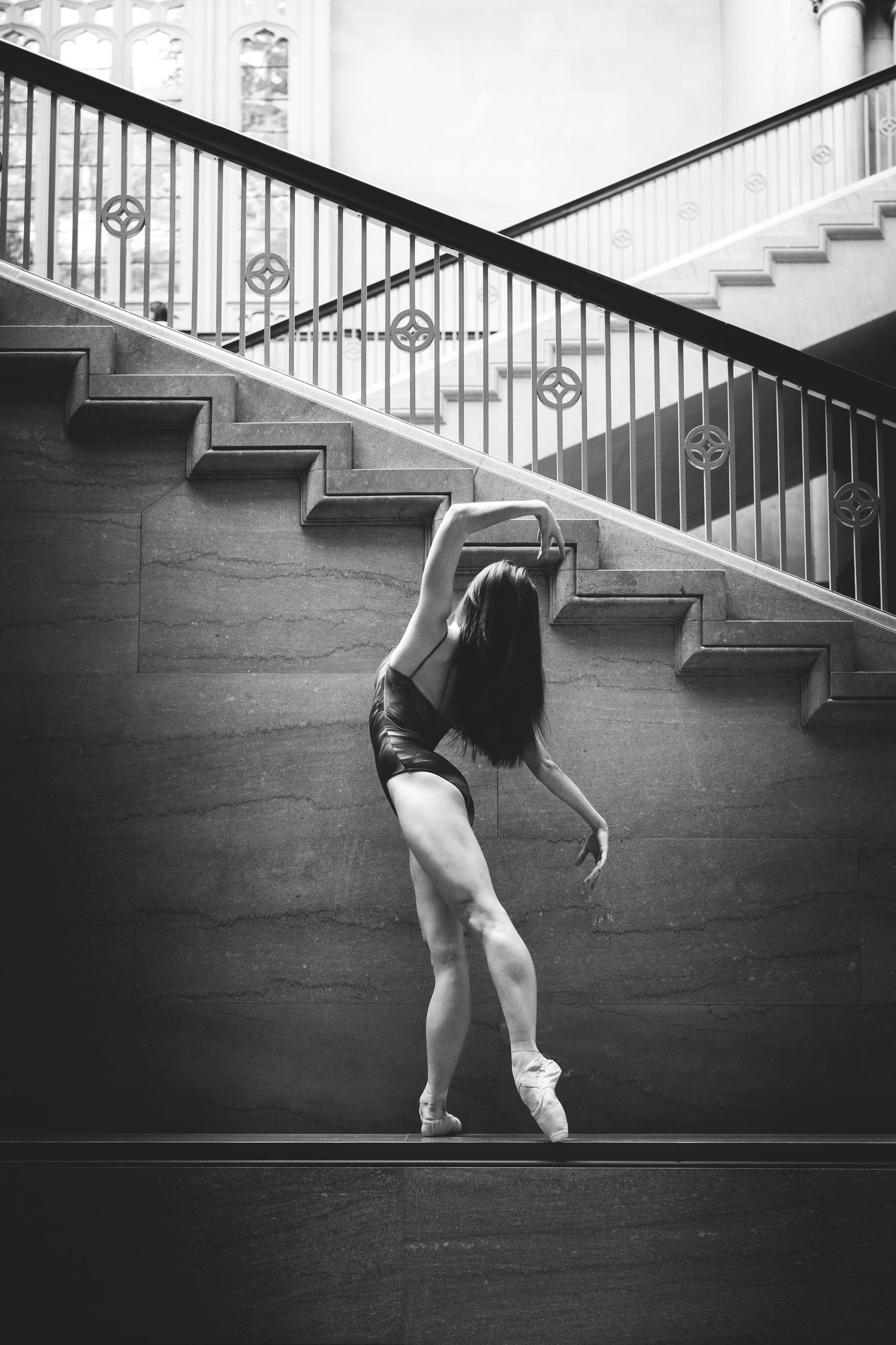 Fine art ballet photoshoot featuring a Joffrey dancer framed by Chicago's historic art institute. Chicago Dance Photography