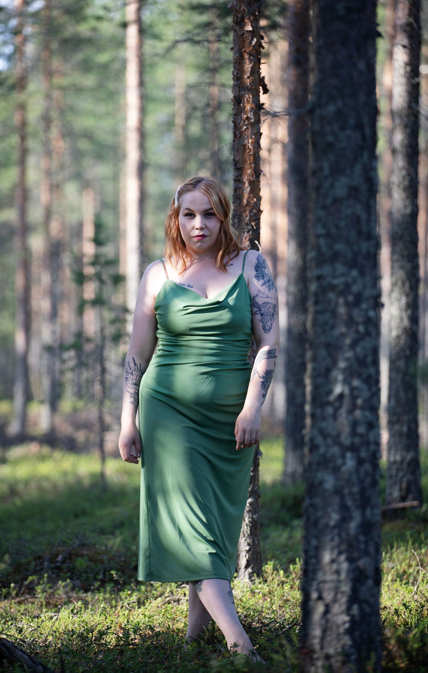 henkilökuvaus metsässä