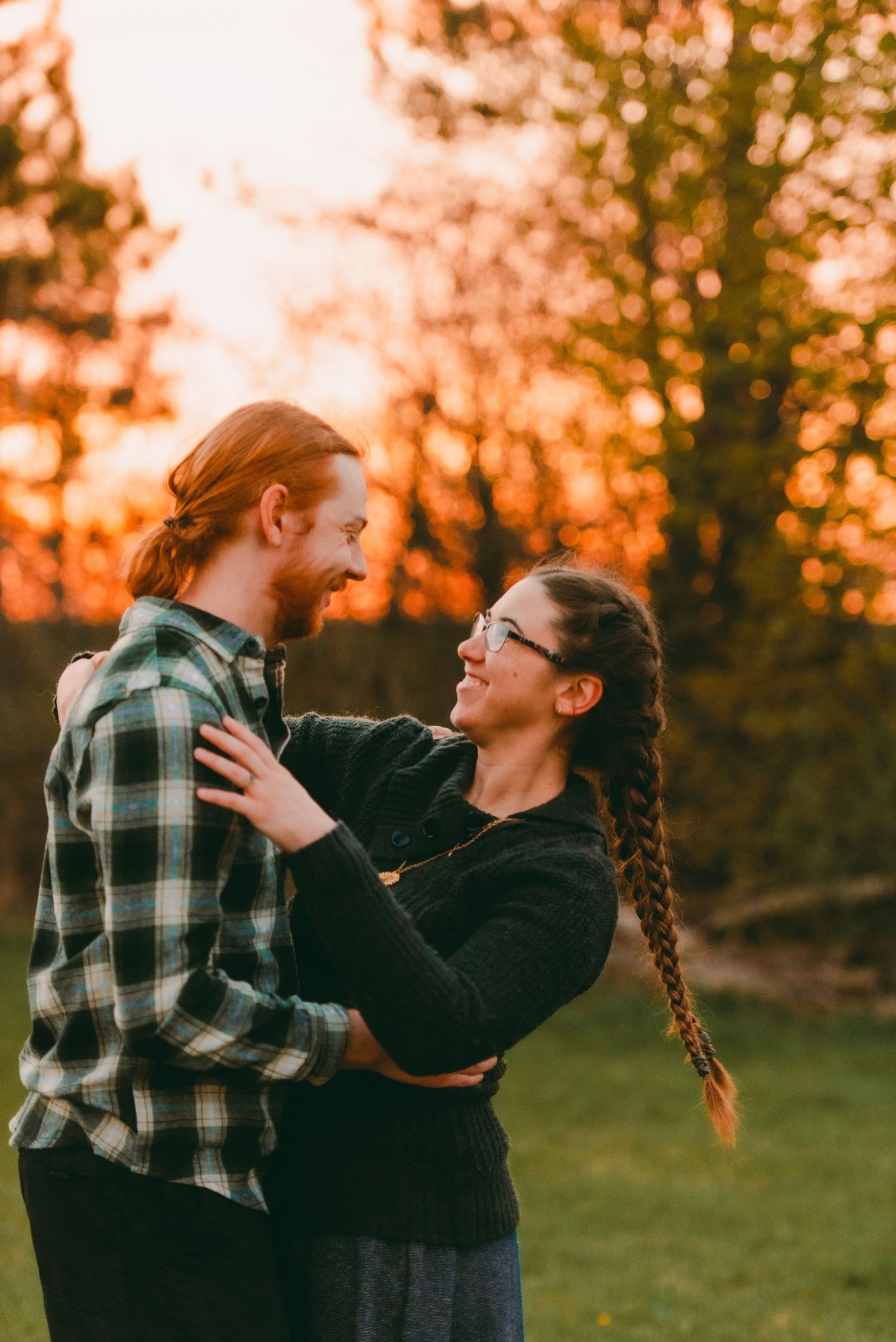 First dance at sunset relaxed bonfire wedding reception