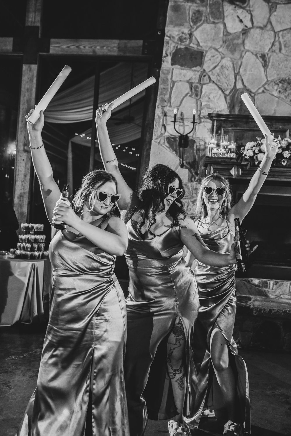 Wedding party tearing up the dance floor with high-energy moves and big laughs during the reception.