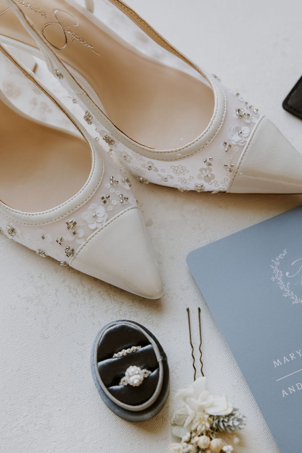 Wedding details at Ever After Farms Stockyard Barn captured by Lindsay McDow Photography. Top Knot Artistry, DJ Last Call